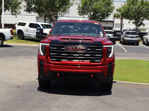 Volcanic Red Tintcoat 2025 GMC Sierra 2500 AT4