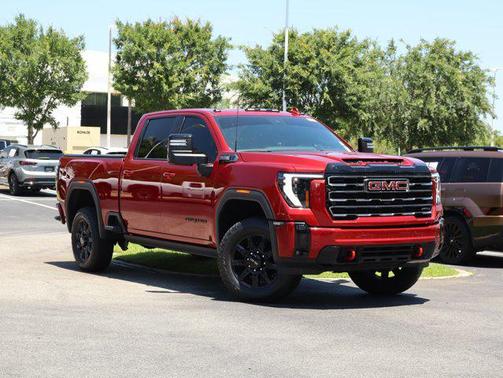 Volcanic Red Tintcoat 2025 GMC Sierra 2500 AT4