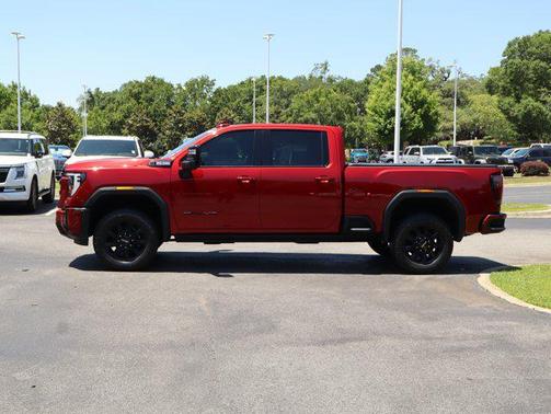 Volcanic Red Tintcoat 2025 GMC Sierra 2500 AT4