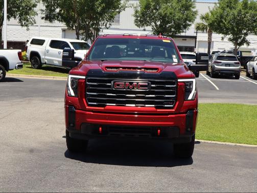 Volcanic Red Tintcoat 2025 GMC Sierra 2500 AT4