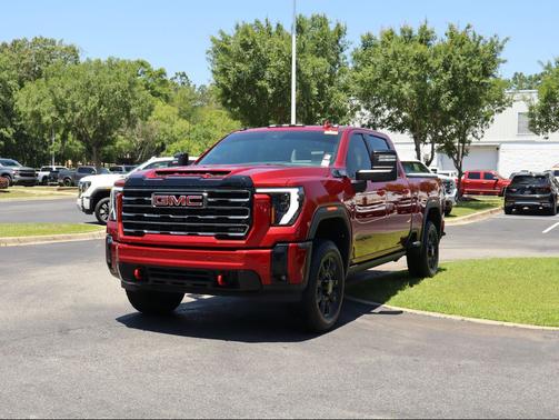 Volcanic Red Tintcoat 2025 GMC Sierra 2500 AT4