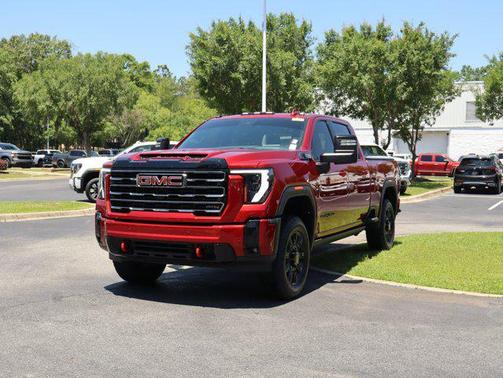 Volcanic Red Tintcoat 2025 GMC Sierra 2500 AT4