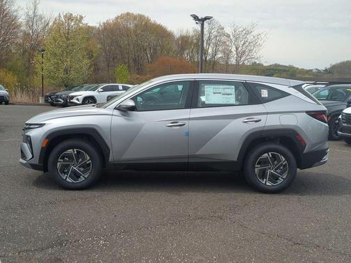 Shimmering Silver 2026 Hyundai TUCSON Hybrid Blue SE