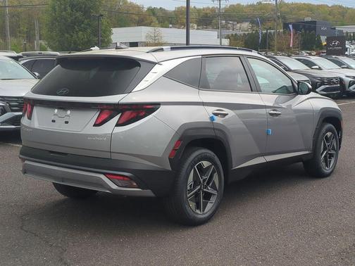 Shimmering Silver 2026 Hyundai TUCSON Hybrid SEL