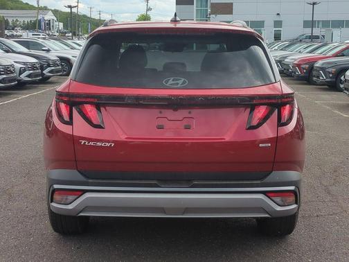 Red 2026 Hyundai TUCSON SEL