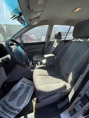 Silver 2009 Kia Rondo LX