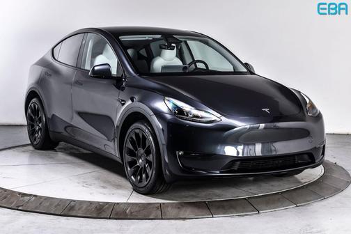 Solid Black 2024 Tesla Model Y Long Range Dual Motor All-Wheel Drive