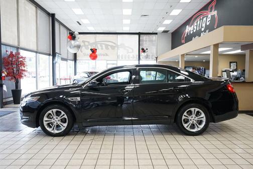 Ruby Red Metallic Tinted Clearcoat 2016 Ford Taurus SEL