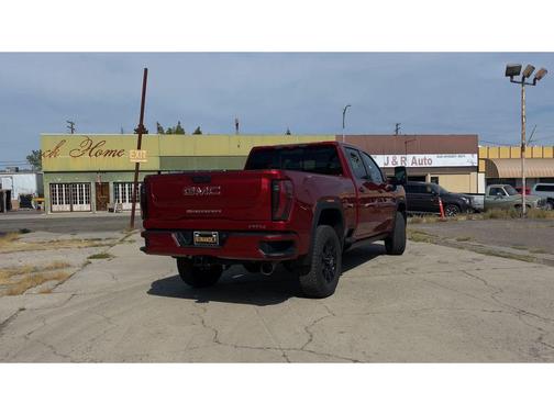 Volcanic Red Tintcoat 2026 GMC Sierra 2500 AT4
