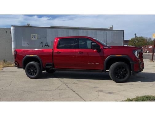 Volcanic Red Tintcoat 2026 GMC Sierra 2500 AT4