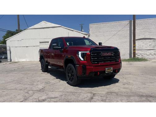 Volcanic Red Tintcoat 2026 GMC Sierra 2500 AT4
