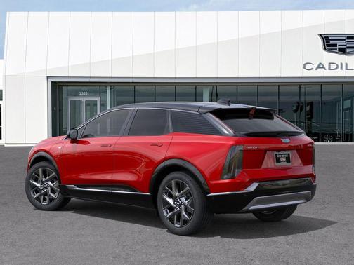 Radiant Red Tintcoat 2025 Cadillac OPTIQ Luxury 1 AWD