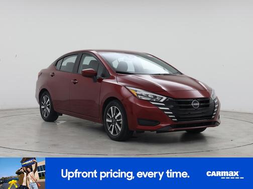Red 2025 Nissan Versa SV