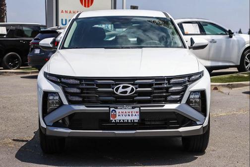 Creamy White Pearl 2026 Hyundai TUCSON Hybrid Blue SE