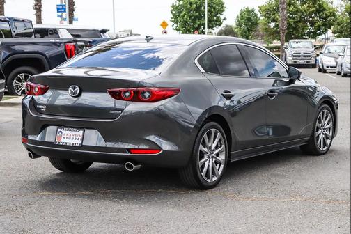 Machine Gray Metallic 2023 Mazda Mazda3 AWD w/Premium Package