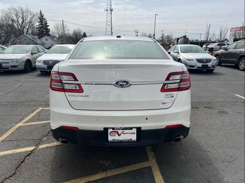 White 2016 Ford Taurus SEL