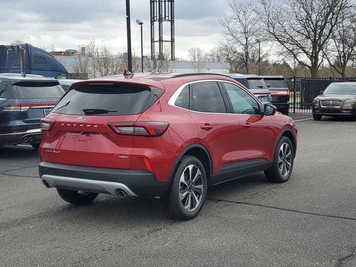 Rapid Red Metallic Tinted Clearcoat 2024 Ford Escape Platinum
