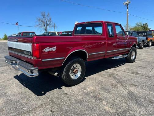 Red 1994 Ford F-250 XL SuperCab H/D