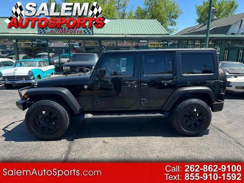 Black Clearcoat 2011 Jeep Wrangler Unlimited Sport
