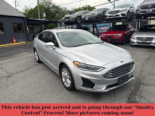 Ingot Silver Metallic 2019 Ford Fusion Hybrid SEL