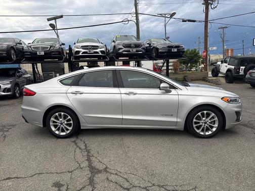 Ingot Silver Metallic 2019 Ford Fusion Hybrid SEL