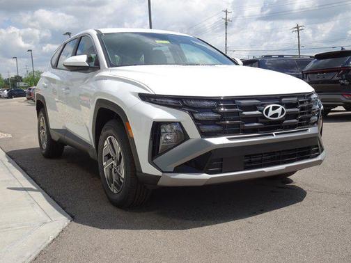 Creamy White Pearl 2026 Hyundai TUCSON Hybrid Blue SE