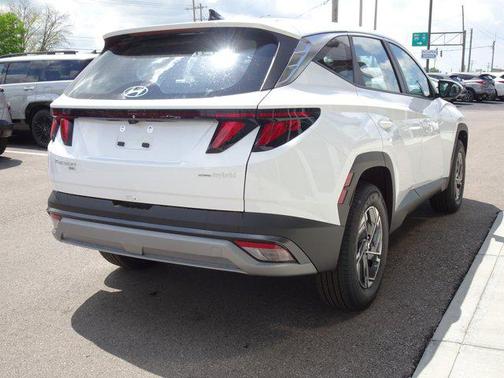 Creamy White Pearl 2026 Hyundai TUCSON Hybrid Blue SE