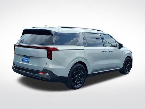 Ivory Silver 2025 Kia Carnival SX Prestige