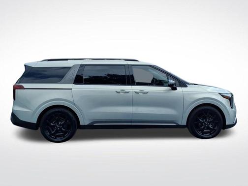 Ivory Silver 2025 Kia Carnival SX Prestige