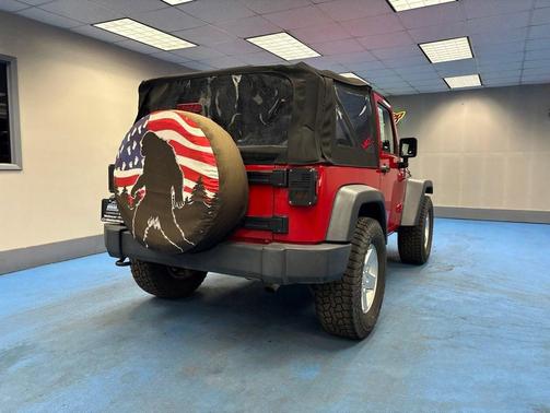 Red 2010 Jeep Wrangler Sport
