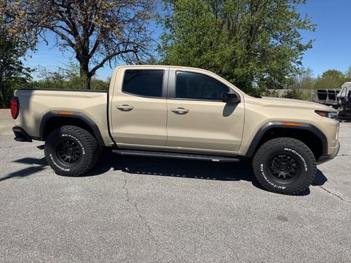 Desert Sand Metallic 2023 GMC Canyon 4WD AT4