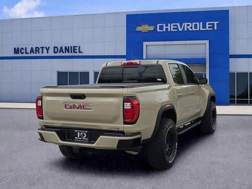 Desert Sand Metallic 2023 GMC Canyon 4WD AT4