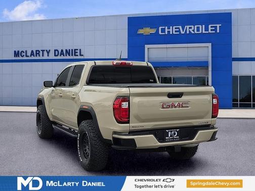 Desert Sand Metallic 2023 GMC Canyon 4WD AT4
