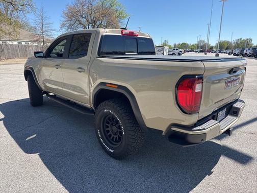 Desert Sand Metallic 2023 GMC Canyon 4WD AT4