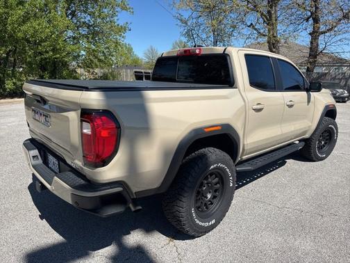 Desert Sand Metallic 2023 GMC Canyon 4WD AT4