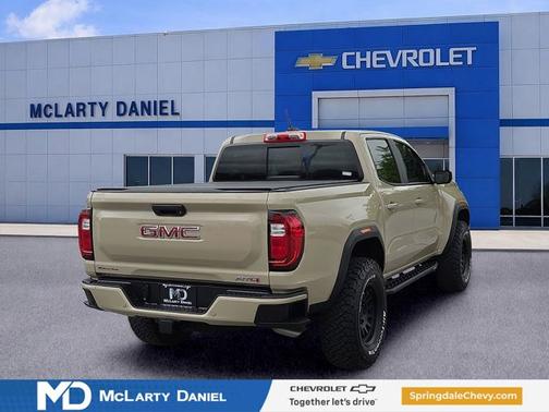 Desert Sand Metallic 2023 GMC Canyon 4WD AT4