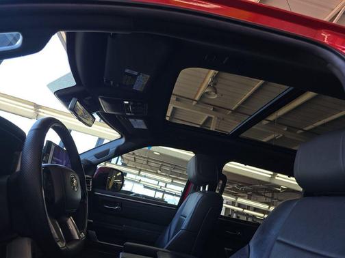 Red 2023 Toyota Tundra Hybrid Platinum