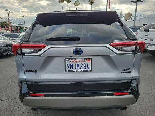 Midnight Black Metallic 2024 Toyota RAV4 Hybrid SE