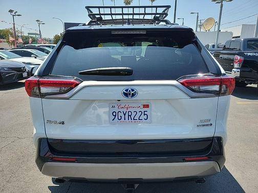 Midnight Black Metallic 2023 Toyota RAV4 Hybrid SE