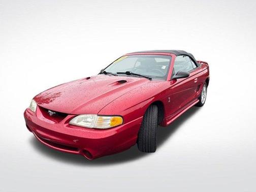 Laser Red Tinted Clearcoat Metallic 1998 Ford Mustang SVT Cobra