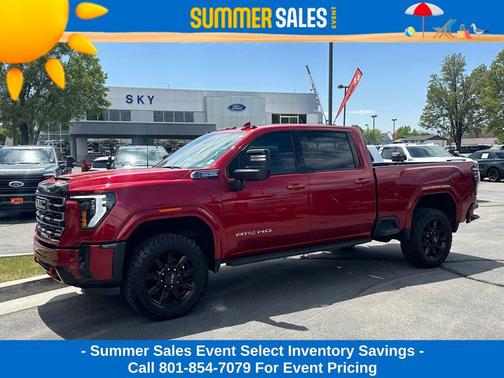 Volcanic Red Tintcoat 2025 GMC Sierra 2500 AT4