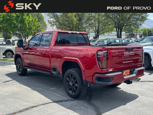 Volcanic Red Tintcoat 2025 GMC Sierra 2500 AT4