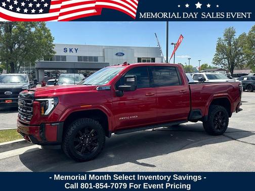 Volcanic Red Tintcoat 2025 GMC Sierra 2500 AT4