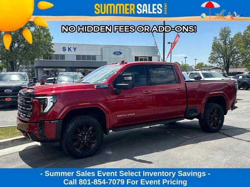 Volcanic Red Tintcoat 2025 GMC Sierra 2500 AT4