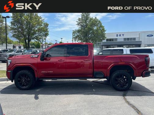 Volcanic Red Tintcoat 2025 GMC Sierra 2500 AT4