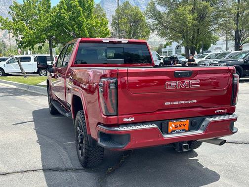 Volcanic Red Tintcoat 2025 GMC Sierra 2500 AT4