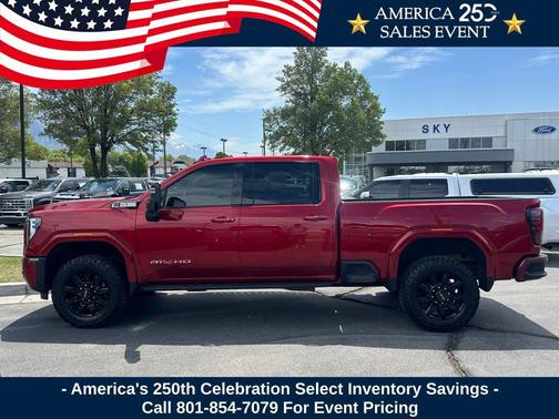 Volcanic Red Tintcoat 2025 GMC Sierra 2500 AT4