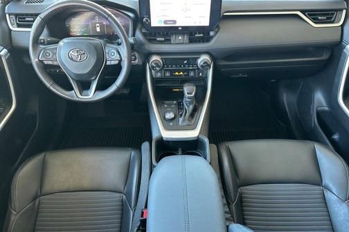 Wind Chill Pearl/Midnight Black Metallic 2023 Toyota RAV4 Hybrid SE