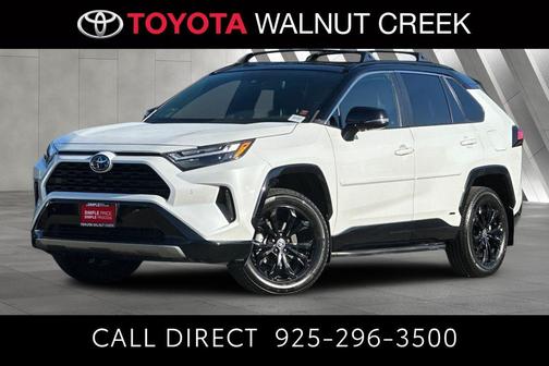 Wind Chill Pearl/Midnight Black Metallic 2023 Toyota RAV4 Hybrid SE