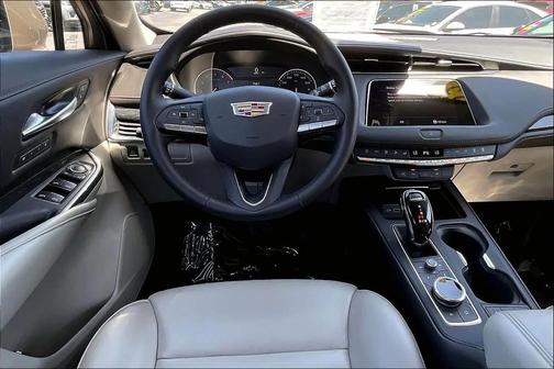 Brown 2023 Cadillac XT4 Premium Luxury